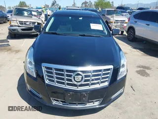 2013 Cadillac XTS Luxury z VIN 2G61P5S30D9220113, wystawiony jako IAAI lot #41970214 z przebiegiem 52 476 mil mil oraz . Historia ofert i sprzedaży dostępna na DreamBid. Obrazek 12.