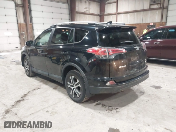 2017 Toyota RAV4 LE with VIN 2T3BFREV8HW571887, listed as a IAAI auction lot 41612815 with 100,742 mi miles and . Bid and sale history available at DreamBid. Image 3.