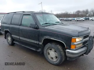 1999 Chevrolet Tahoe Z71 with VIN 1GNEK13R9XJ515820, listed as a IAAI auction lot 42004125 with 251,184 mi miles and . Bid and sale history available at DreamBid. Image 1.
