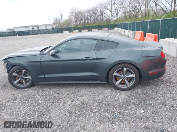2015 Ford Mustang V6 with VIN 1FA6P8AM0F5336013, listed as a IAAI auction lot 42048451 with 132,905 mi miles and . Bid and sale history available at DreamBid. Image 14.
