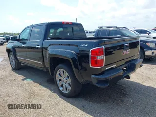 2015 GMC Sierra 1500 Denali z VIN 3GTU2WEJ9FG386812, wystawiony jako IAAI lot #42381651 z przebiegiem 138 009 mil mil oraz . Historia ofert i sprzedaży dostępna na DreamBid. Obrazek 3.