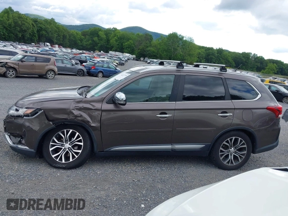 2016 Mitsubishi Outlander GT z VIN JA4JZ4AXXGZ002867, wystawiony jako IAAI lot #42327299 z przebiegiem 85 538 mil mil oraz . Historia ofert i sprzedaży dostępna na DreamBid. Obrazek 14.