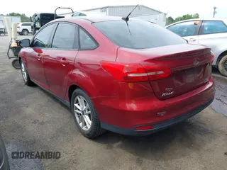2015 Ford Focus SE with VIN 1FADP3F22FL259223, listed as a IAAI auction lot 42333439 with 77,111 mi miles and . Bid and sale history available at DreamBid. Image 3.