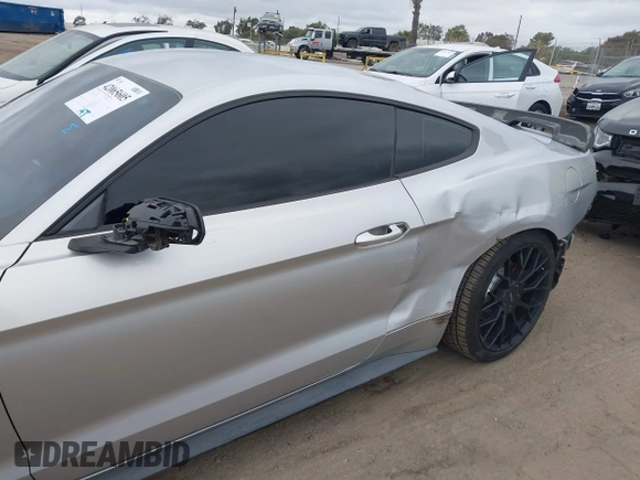 2015 Ford Mustang V6 with VIN 1FA6P8AM2F5370342, listed as a IAAI auction lot 42065605 with 141,569 mi miles and . Bid and sale history available at DreamBid. Image 6.