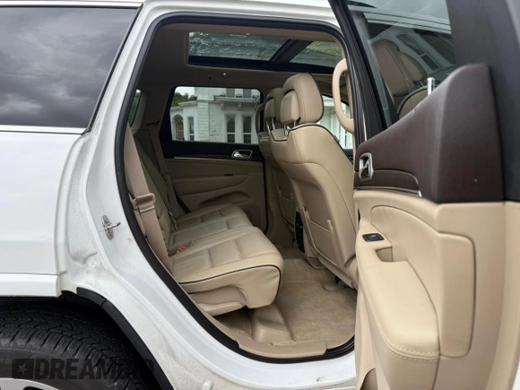 2018 Jeep Grand Cherokee Overland with VIN 1C4RJFCG8JC505915, listed as a Copart auction lot 58612095 with 112,817 mi miles and Clean title. Bid and sale history available at DreamBid. Image 6.