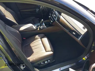 2018 BMW 5 Series M550i xDrive with VIN WBAJB9C51JB049513, listed as a IAAI auction lot 41146990 with 51,218 mi miles. Bid and sale history available at carsss.com. Image 5.