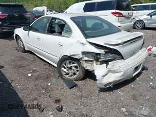 2004 Pontiac Grand Am SE1 with VIN 1G2NF52E04C247005, listed as a IAAI auction lot 42134458 with 213,754 mi miles and . Bid and sale history available at DreamBid. Image 3.