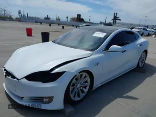2018 Tesla Model S 75D with VIN 5YJSA1E25JF245269, listed as a IAAI auction lot 41914567 with 56,086 mi miles and . Bid and sale history available at DreamBid. Image 20.