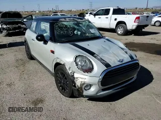 2017 MINI Hardtop Cooper with VIN WMWXP5C34H2F61072, listed as a Copart auction lot 57314695 with 46,693 mi miles and Salvage title. Bid and sale history available at DreamBid. Image 13.