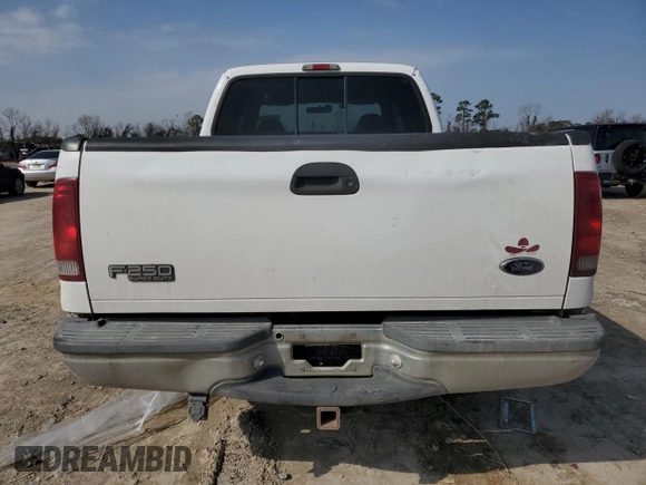 1999 Ford Super Duty F-250 XL with VIN 1FTNW21F9XED82013, listed as a Copart auction lot 44962945 with 394,926 mi miles and Clean Title. Bid and sale history available at carsss.com. Image 6.