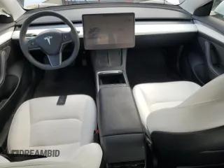 2023 Tesla Model 3 with VIN 5YJ3E1EAXPF600008, listed as a Copart auction lot 51868055 with 58,733 mi miles and Salvage title. Bid and sale history available at DreamBid. Image 8.