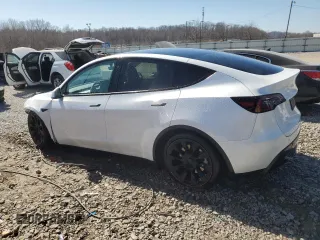 2023 Tesla Model Y Long Range with VIN 7SAYGDEE5PF691745, listed as a Copart auction lot 47784545 with 21,117 mi miles and Salvage Title. Bid and sale history available at DreamBid. Image 2.