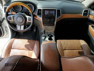 2013 Jeep Grand Cherokee Overland with VIN 1C4RJFCT7DC524585, listed as a Copart auction lot 48325145 with 142,308 mi miles and Clean Title. Bid and sale history available at carsss.com. Image 8.