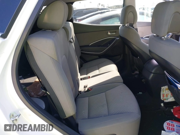 2017 Hyundai Santa Fe 2.4L z VIN 5XYZTDLB0HG403842, wystawiony jako IAAI lot #42206543 z przebiegiem 77 900 mil mil oraz . Historia ofert i sprzedaży dostępna na DreamBid. Obrazek 8.