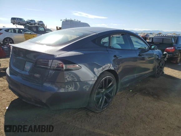 2023 Tesla Model S Plaid with VIN 5YJSA1E64PF499373, listed as a Copart auction lot 78744674 with Not provided miles and Salvage title. Bid and sale history available at DreamBid. Image 3.