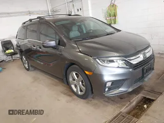 2018 Honda Odyssey EX-L z VIN 5FNRL6H79JB013982, wystawiony jako IAAI lot #42288040 z przebiegiem 82 416 mil mil oraz . Historia ofert i sprzedaży dostępna na DreamBid. Obrazek 1.