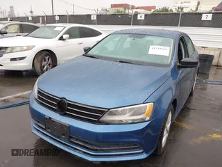 2015 Volkswagen Jetta Sedan 1.8T SE with VIN 3VWD17AJ5FM310694, listed as a IAAI auction lot 41735569 with 147,232 mi miles. Bid and sale history available at carsss.com. Image 6.
