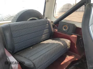 1987 Jeep Wrangler z VIN 2BCCV8137HB529480, wystawiony jako Copart lot #60081245 z przebiegiem 717 279 mil mil oraz Czysty tytuł • Clean title. Historia ofert i sprzedaży dostępna na DreamBid. Obrazek 10.