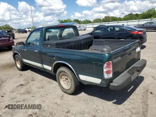1999 Toyota Tacoma z VIN 4TANL42N5XZ453478, wystawiony jako Copart lot #56711635 z przebiegiem 197 412 mil mil oraz Szkoda całkowita • Salvage title. Historia ofert i sprzedaży dostępna na DreamBid. Obrazek 2.