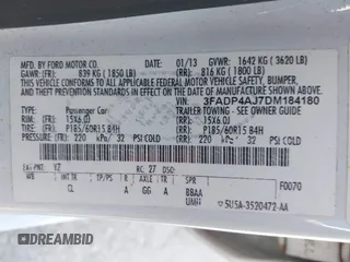 2013 Ford Fiesta S with VIN 3FADP4AJ7DM184180, listed as a IAAI auction lot 42632804 with 176,729 mi miles and . Bid and sale history available at DreamBid. Image 9.