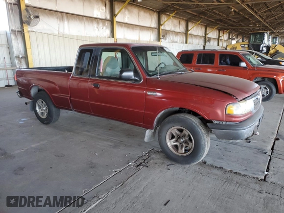 1999 Mazda B-Series 2WD Truck SE with VIN 4F4YR16V0XTM10024, listed as a Copart auction lot 82905694 with 163,025 mi miles and Salvage Title. Bid and sale history available at carsss.com. Image 4.