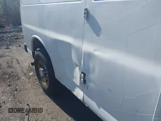 2014 Chevrolet Express Cargo with VIN 1GCWGGCA5E1125676, listed as a IAAI auction lot 42234161 with 285,045 mi miles and . Bid and sale history available at DreamBid. Image 6.