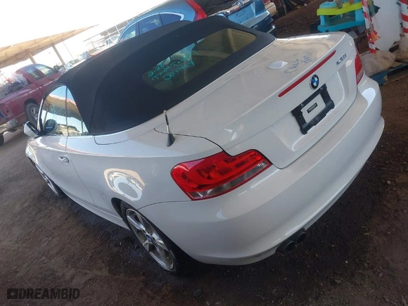 2013 BMW 1 Series 128i with VIN WBAUN1C55DVR01404, listed as a IAAI auction lot 41682695 with 100,948 mi miles. Bid and sale history available at carsss.com. Image 3.