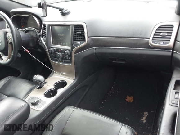 2014 Jeep Grand Cherokee Limited with VIN 1C4RJFBG5EC555128, listed as a IAAI auction lot 42129958 with 98,237 mi miles. Bid and sale history available at carsss.com. Image 5.
