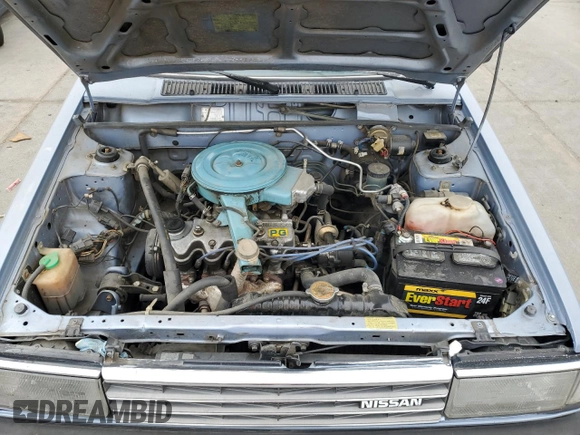 1985 Nissan Sentra z VIN JN1PB15S6FU172045, wystawiony jako Copart lot #54384475 z przebiegiem 134 117 mil mil oraz Szkoda całkowita • Salvage title. Historia ofert i sprzedaży dostępna na DreamBid. Obrazek 11.