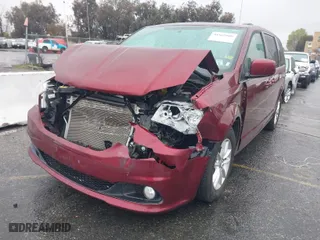 2018 Dodge Grand Caravan SXT with VIN 2C4RDGCG5JR241220, listed as a IAAI auction lot 41562508 with 51,529 mi miles. Bid and sale history available at carsss.com. Image 2.