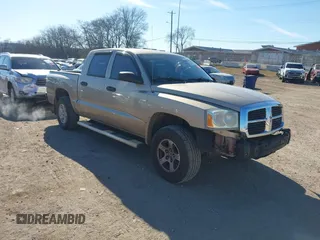 2005 Dodge Dakota SLT with VIN 1D7HE48K05S109500, listed as a IAAI auction lot 41379985 with 95,167 mi miles and . Bid and sale history available at DreamBid. Image 1.