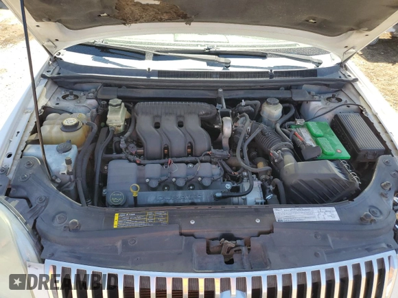 2005 Mercury Montego Luxury z VIN 1MEFM40155G626347, wystawiony jako Copart lot #46715235 z przebiegiem 213 883 mil mil oraz Szkoda całkowita • Salvage title. Historia ofert i sprzedaży dostępna na DreamBid. Obrazek 11.