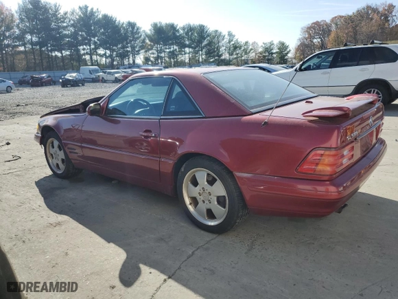 2000 Mercedes-Benz SL-Class with VIN WDBFA68FXYF193901, listed as a Copart auction lot 79173514 with 143,019 mi miles and Salvage Title. Bid and sale history available at carsss.com. Image 2.