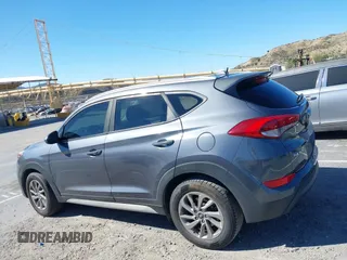 2018 Hyundai Tucson SEL with VIN KM8J3CA42JU618764, listed as a IAAI auction lot 41677046 with 127,980 mi miles. Bid and sale history available at carsss.com. Image 14.