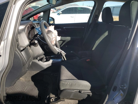 2018 Honda Fit LX with VIN 3HGGK5G46JM703892, listed as a Copart auction lot 79742984 with 67,825 mi miles and Salvage Title. Bid and sale history available at DreamBid. Image 7.