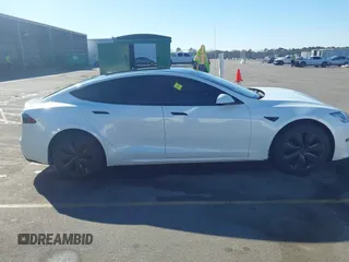 2021 Tesla Model S Long Range with VIN 5YJSA1E56MF453711, listed as a IAAI auction lot 41467603 with 115,634 mi miles and . Bid and sale history available at DreamBid. Image 13.
