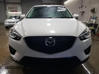 2014 Mazda CX-5 Grand Touring with VIN JM3KE4DY7E0417308, listed as a Copart auction lot 88161195 with 107,493 mi miles and Salvage Title. Bid and sale history available at carsss.com. Image 5.
