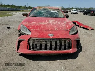 2023 Toyota 86 z VIN JF1ZNBB12P9762364, wystawiony jako Copart lot #49657495 z przebiegiem Nie podano mil oraz Nie do naprawy • Non repairable. Historia ofert i sprzedaży dostępna na DreamBid. Obrazek 11.