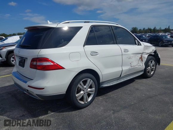 2015 Mercedes-Benz M 350 with VIN 4JGDA5JB9FA590659, listed as a IAAI auction lot 40591295 with 117,825 mi miles and . Bid and sale history available at DreamBid. Image 4.