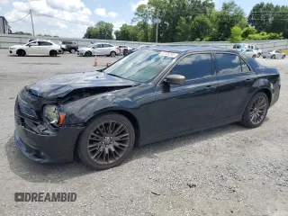 2013 Chrysler 300 C John Varvatos Limited Edition with VIN 2C3CCADG7DH702999, listed as a Copart auction lot 57135295 with 188,362 mi miles and Salvage title. Bid and sale history available at DreamBid. Image 1.