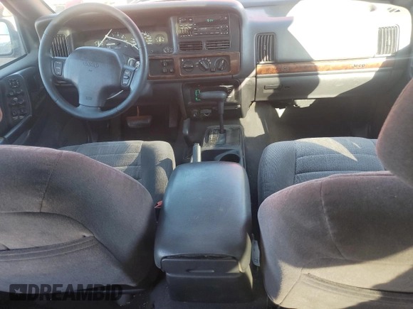 1997 Jeep Grand Cherokee Laredo with VIN 1J4GZ58S1VC760400, listed as a Copart auction lot 43932815 with 108,112 mi miles and Salvage Title. Bid and sale history available at carsss.com. Image 8.