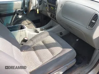 2003 Ford Explorer Sport Trac XLS z VIN 1FMZU77E73UB97392, wystawiony jako IAAI lot #42400398 z przebiegiem 160 556 mil mil oraz . Historia ofert i sprzedaży dostępna na DreamBid. Obrazek 5.