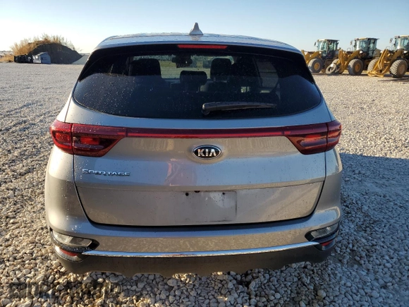 2021 Kia Sportage LX with VIN KNDPMCAC0M7945282, listed as a Copart auction lot 79599224 with 84,685 mi miles and Clean Title. Bid and sale history available at carsss.com. Image 6.