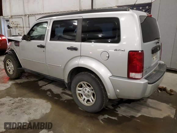 2011 Dodge Nitro SE z VIN 1D4PU2GK4BW506939, wystawiony jako Copart lot #80784344 z przebiegiem 194 357 mil mil oraz Szkoda całkowita • Salvage title. Historia ofert i sprzedaży dostępna na DreamBid. Obrazek 2.