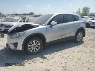 2016 Mazda CX-5 Touring z VIN JM3KE4CY1G0881988, wystawiony jako Copart lot #43231125 z przebiegiem 63 598 mil mil oraz Szkoda całkowita • Salvage title. Historia ofert i sprzedaży dostępna na DreamBid. Obrazek 1.