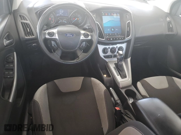 2012 Ford Focus SE with VIN 1FAHP3F29CL346226, listed as a Copart auction lot 61029345 with 172,533 mi miles and Salvage title. Bid and sale history available at DreamBid. Image 8.