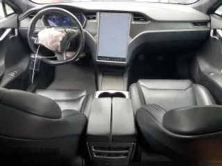 2019 Tesla Model S 75D with VIN 5YJSA1E25KF299740, listed as a Copart auction lot 55821595 with 140,385 mi miles and Salvage title. Bid and sale history available at DreamBid. Image 8.