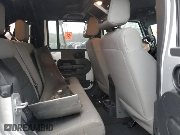 2008 Jeep Wrangler Unlimited X with VIN 1J4GB39138L608458, listed as a Copart auction lot 43549075 with 100,565 mi miles and Salvage Title. Bid and sale history available at DreamBid. Image 11.