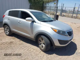 2012 Kia Sportage LX with VIN KNDPB3A27C7326884, listed as a IAAI auction lot 42010016 with 112,797 mi miles. Bid and sale history available at carsss.com. Image 1.