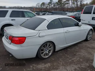 2011 BMW 3 Series 335i with VIN WBADX7C51BE742780, listed as a IAAI auction lot 41636961 with Not Provided miles and . Bid and sale history available at carsss.com. Image 4.